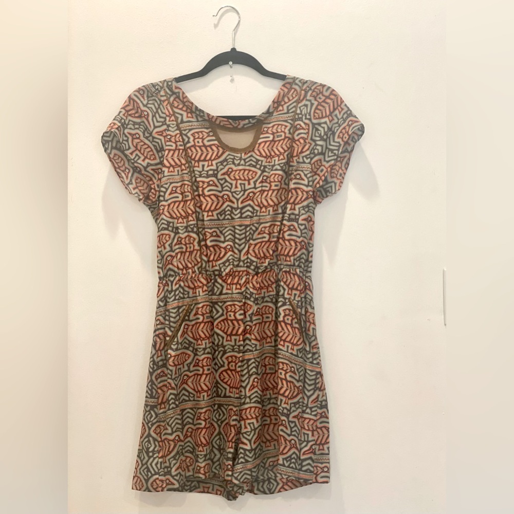 Cotelac romper with open back and beautiful details